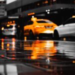 yellow taxi cab on road during night time